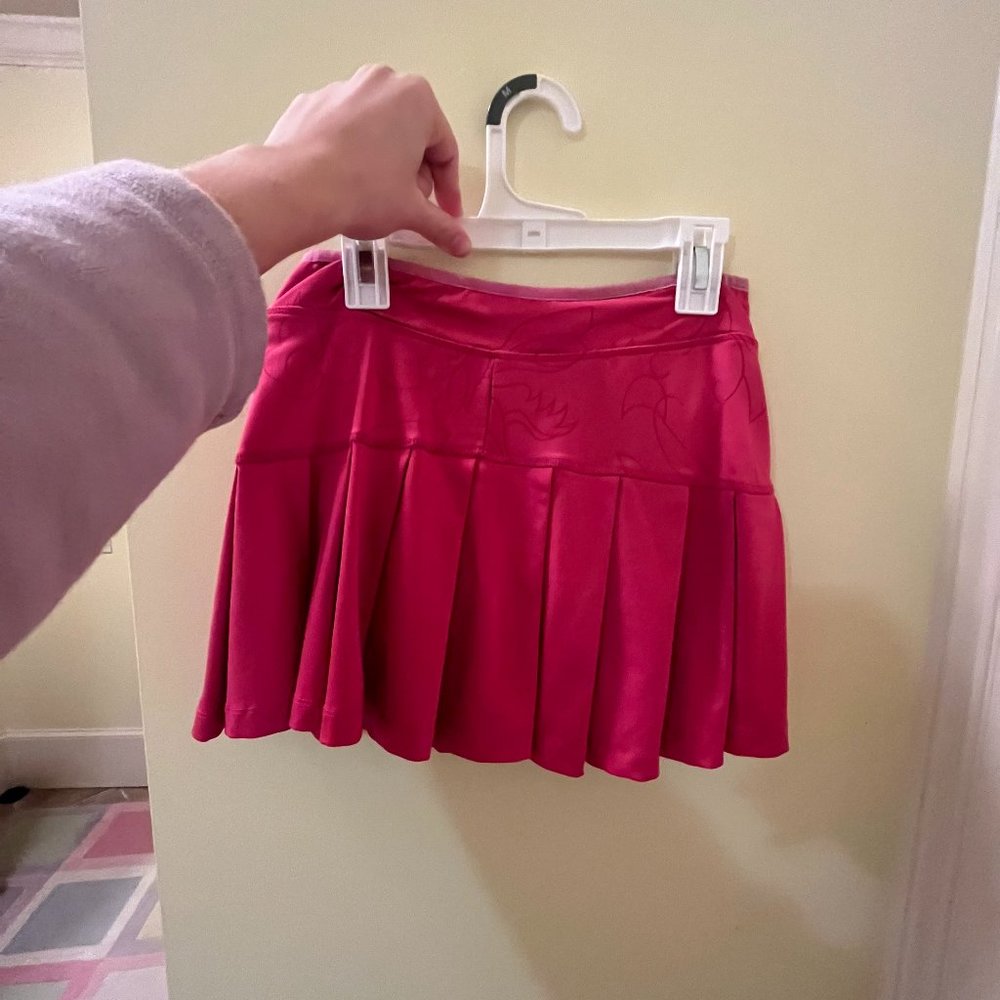Pink pleated tennis skirt